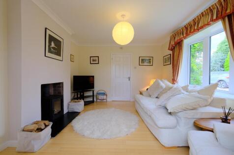 Comfortable sitting room with log burner