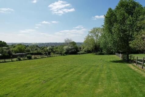 Lovely fenced paddock by garden