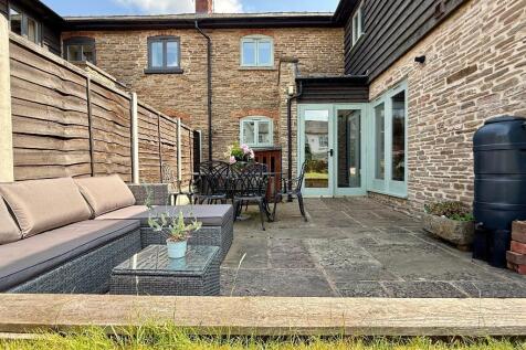 Patio and rear of Rowberry Cottage