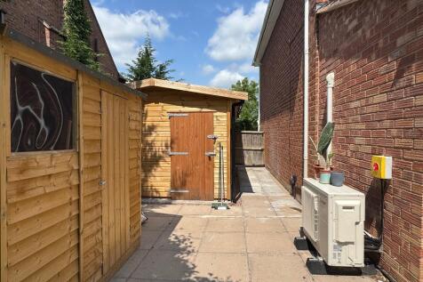 Solid wooden garage and garden shed