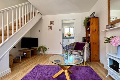 Sitting room with TV area (under stairs)