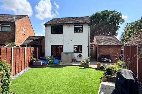 Rear of house, garden and garage
