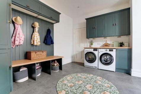 Large utility room with cloakroom