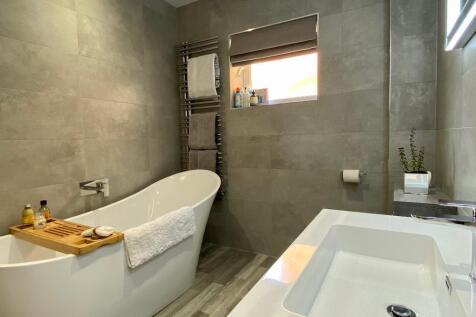 Family bathroom with bath &amp; shower