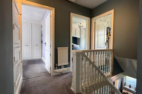 Landing to 4 bedrooms