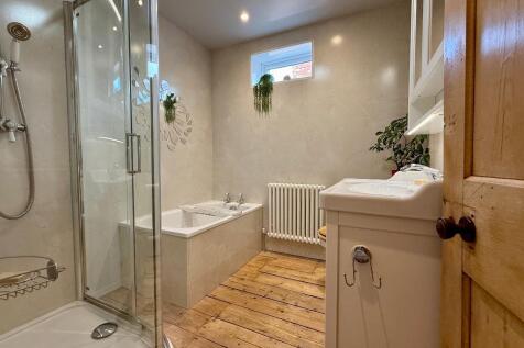Family bathroom with bath &amp; shower