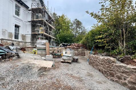 New parking area with Malvern stone wall