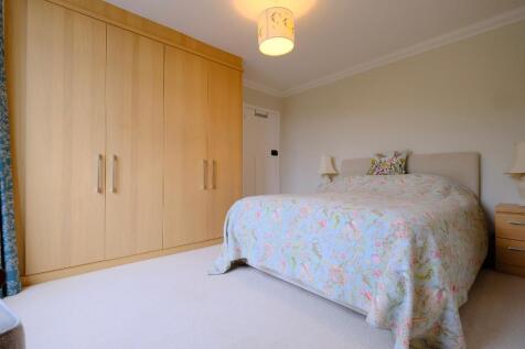 Main bedroom with fitted wardrobes
