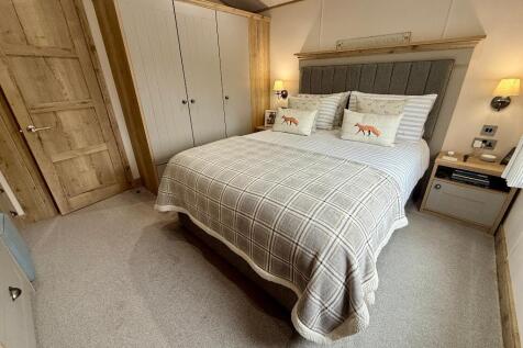 Bedroom 1 with ensuite shower &amp; storage