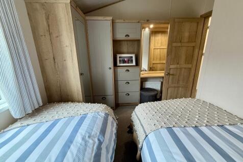 Bedroom 2 showing fitted wardrobes