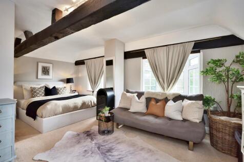 Bedroom 1 with seating and dressing area