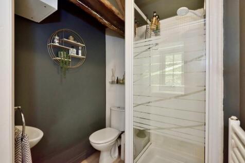 Family shower room heated towel rail