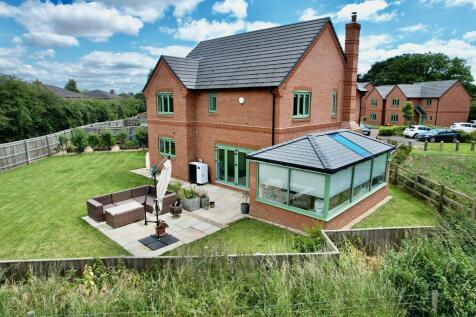 Terrace, sun room and rear garden