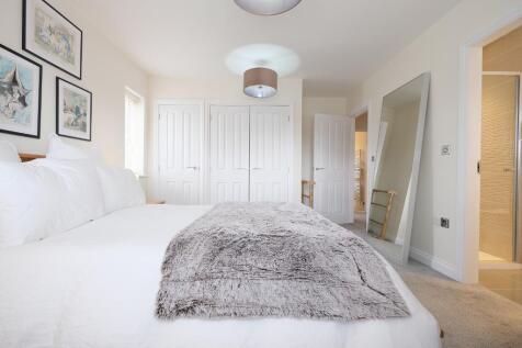 Main bedroom with fitted wardrobes