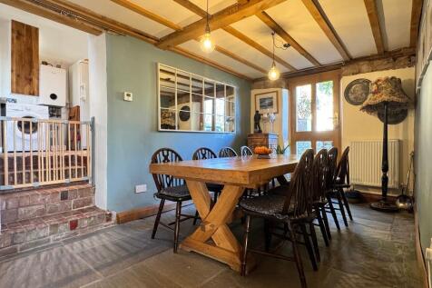 Dining area &amp; steps to utility/dog room