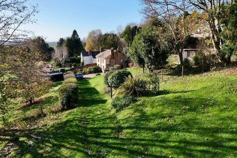 Land to the right side of the house