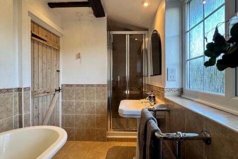 Family bathroom and separate shower