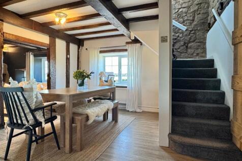 Dining room, stairs to bedrooms