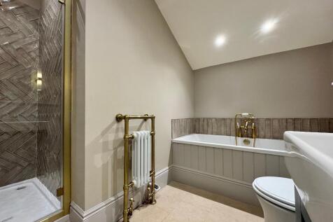 Family bathroom with enclosed shower