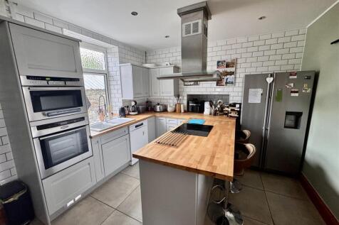 Kitchen with utility area