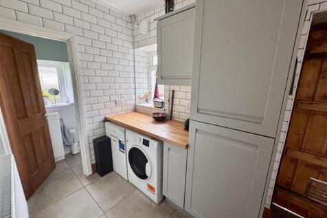Kitchen with utility area