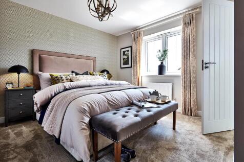 The main bedroom offers a quiet space away from the rest of the home