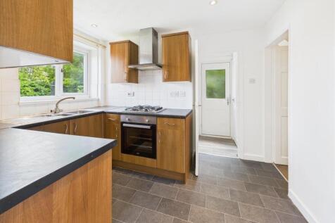 Nicely Fitted Kitchen Through To Utility Area