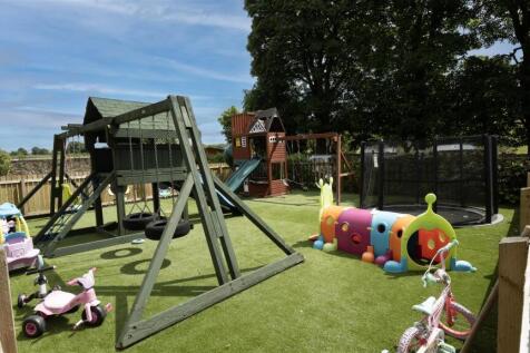 Kids play toys outside front.jpg