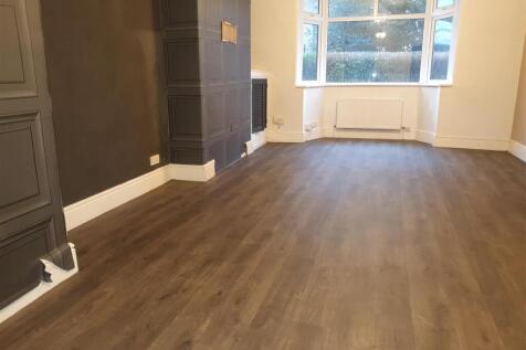 SPACIOUS THROUGH LOUNGE/DINING ROOM