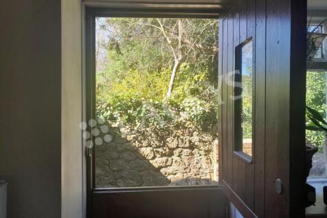 Stable door looking out onto courtyard garden