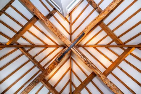 Apex of beams to second floor ceiling