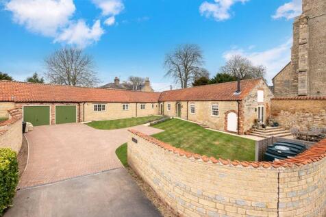 Overall front grounds/driveway/garaging