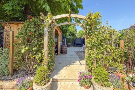 Archway to rear part of garden