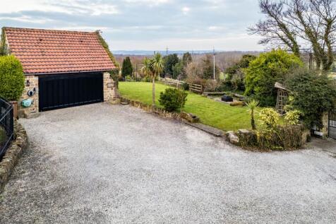 Garage and front garden 