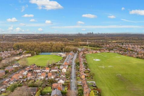 Views of Cricket Club Front and Playing Fields Rea