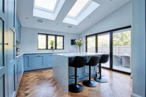 Kitchen shwoing island and breakfast area.jpg