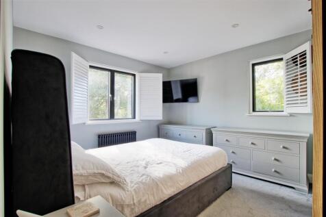 Bedroom one with blinds open.jpg