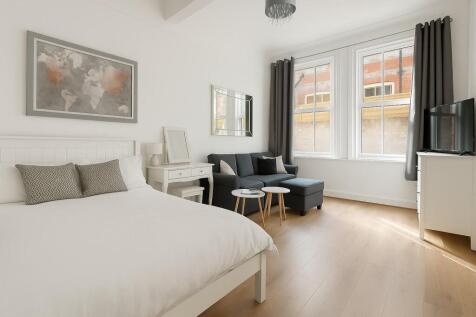 Serene Daylight Bedroom with Modern Touches.jpeg
