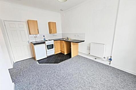 Open plan lounge/kitchen