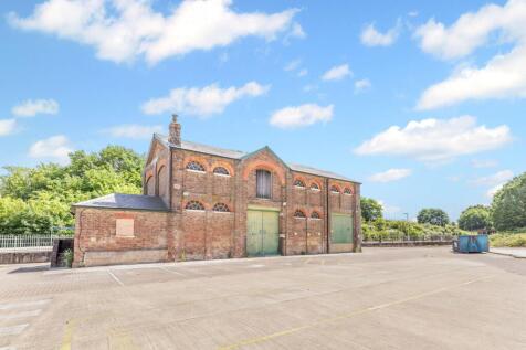 The former Travis Perkins Site, The Causeway, Arundel, BN18 9JL