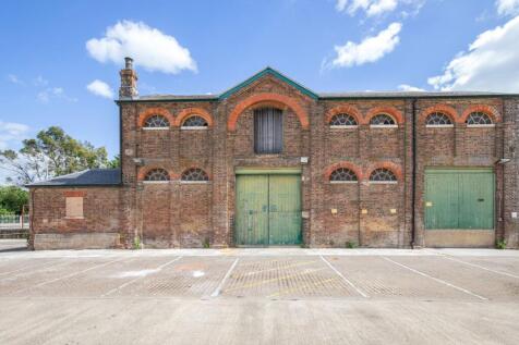 The former Travis Perkins Site, The Causeway, Arundel, BN18 9JL