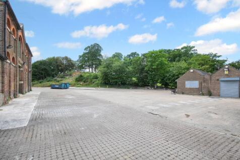 The former Travis Perkins Site, The Causeway, Arundel, BN18 9JL