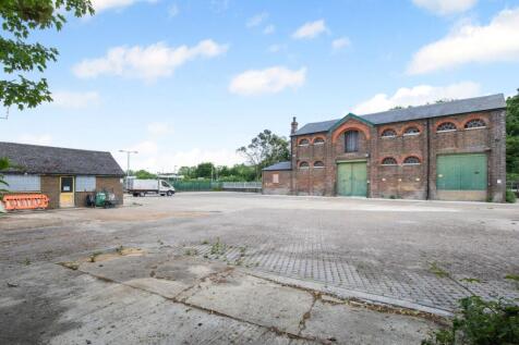 The former Travis Perkins Site, The Causeway, Arundel, BN18 9JL
