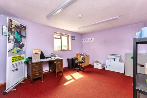 Land on the south-west side of 99 Watling Street West, Towcester NN12 6AG.