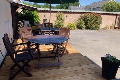 Decking and seating area to rear