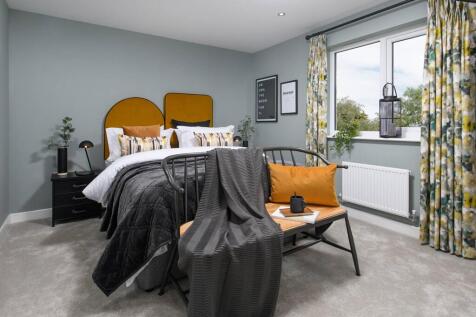 The spacious main bedroom