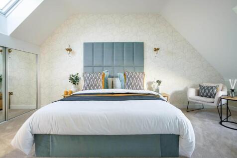 The main bedroom occupies the entire second floor, creating a sanctuary away from the rest of the h