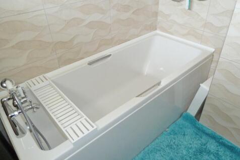 Bath, shower above.