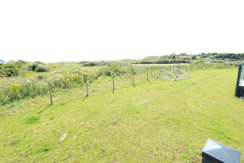 VIEWS OVER OPEN FIELDS/BEACH