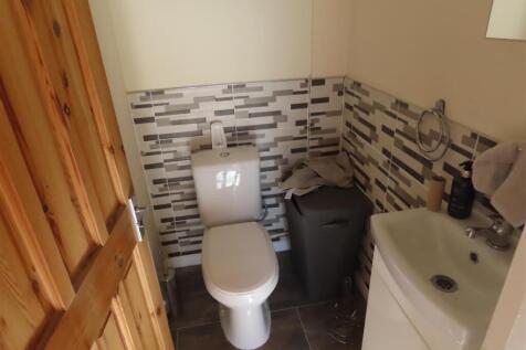 DOWNSTAIRS WC/CLOAKS